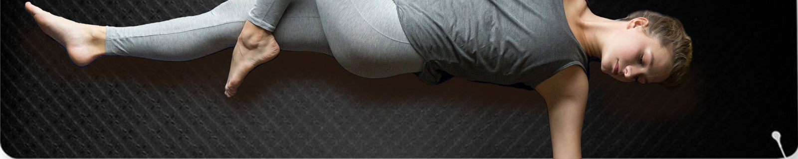 Banner of woman lying on a grounding yoga - wellness mat
