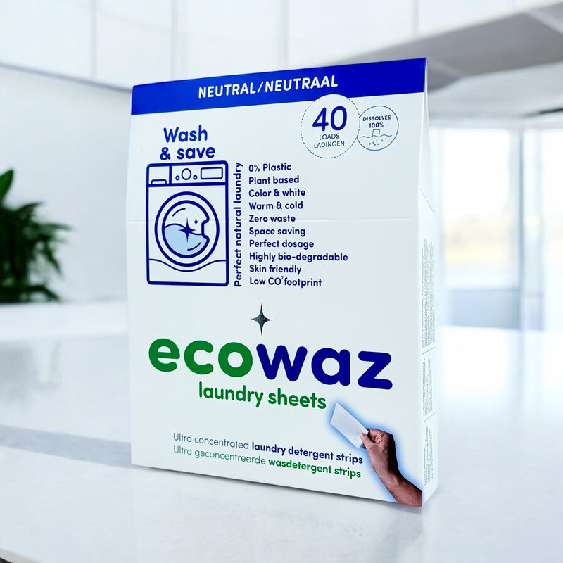 Box of ecowaz laundry sheets with neutral branding on a blurred background