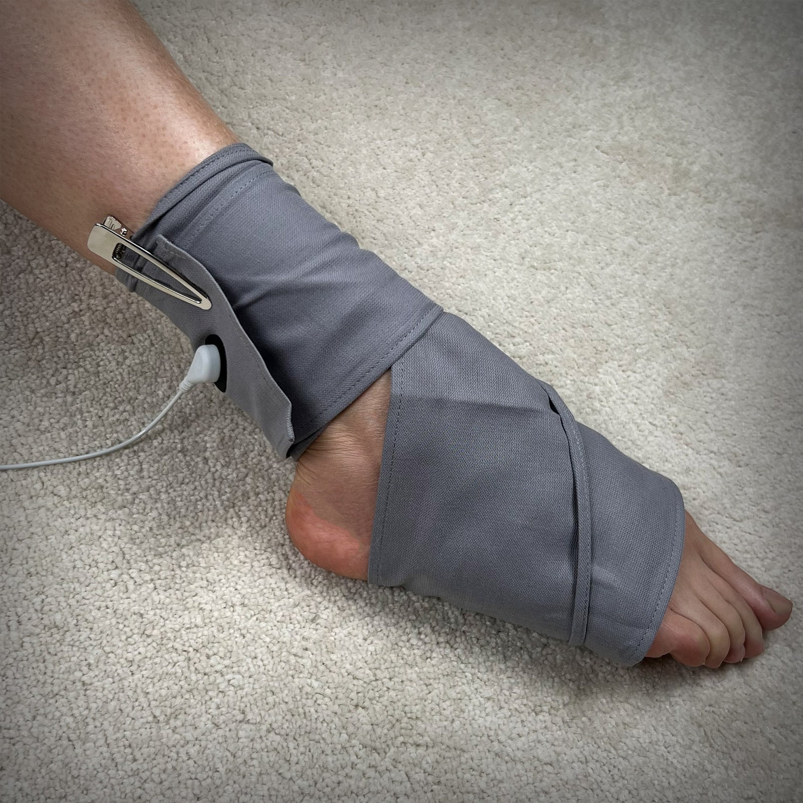 Silver Grounding Body Wrap on foot