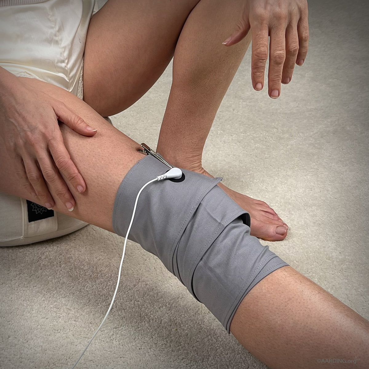 Silver Grounding Body Wrap around knee